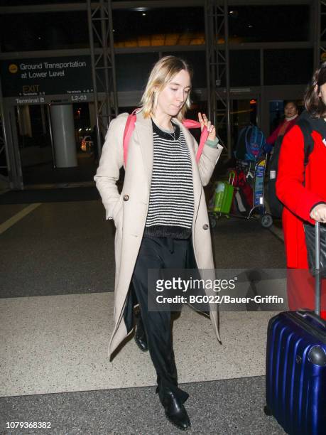 Saoirse Ronan is seen at Los Angeles International Airport on January 07, 2019 in Los Angeles, California.