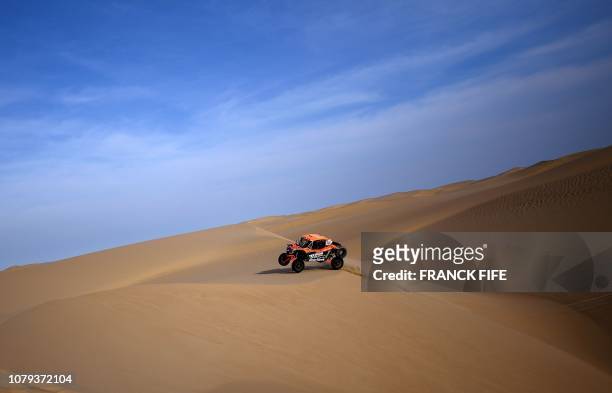Driver Robby Gordon and co-driver Kellon Walch compete during the Stage 2 of the Dakar 2019 between Pisco and San Juan de Marcona, Peru, on January...