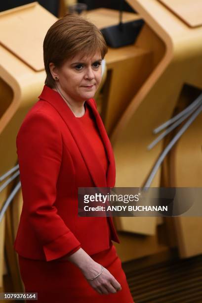 First Minister of Scotland Nicola Sturgeon prepares to make a statement and take questions in the Scottish Parliament in Edinburgh, Scotland, on...