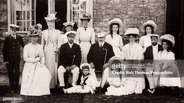 Royal gathering at Osborne House on the Isle of Wight including the British and Russian royal families, on 4th August 1909. Left to right, back row:...