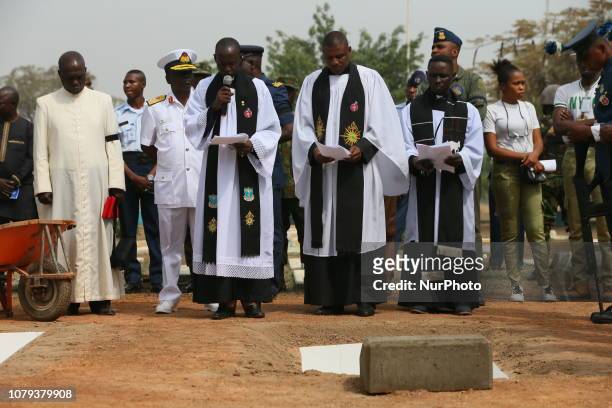Priest conducts funeral service for the the remains of five officers who died in the helicopter crash in Damasak, in Abuja, Nigeria on January 8th...