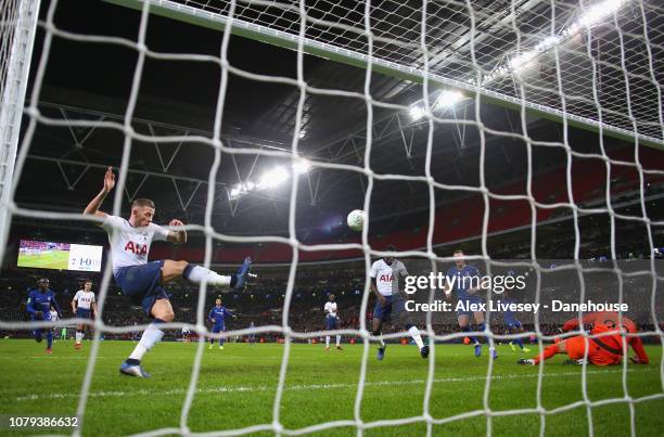 Toby Alderweireld of Tottenham Hotspur clears the ball off the line after a save from Paulo Gazzaniga during the Carabao Cup semi-final first leg...