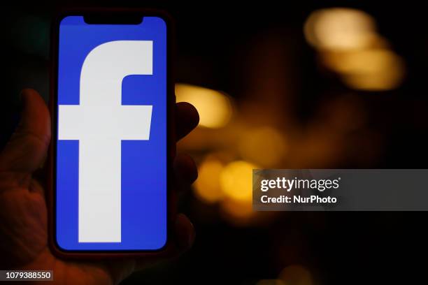 The Facebook logo is seen on an iPhone X in this photo illustration on January 8, 2019.