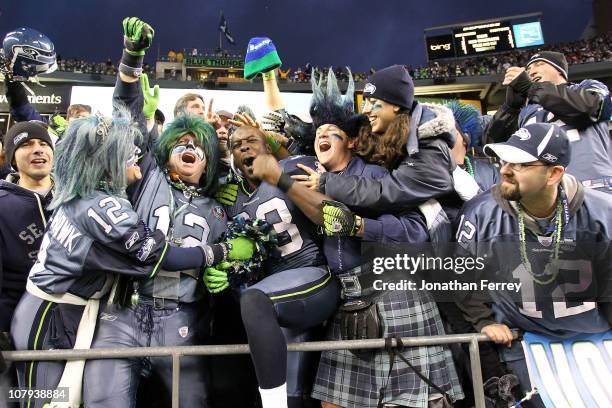 Leon Washington of the Seattle Seahawks celebrates the Seahawks 41-36 victory against the New Orleans Saints during the 2011 NFC wild-card playoff...