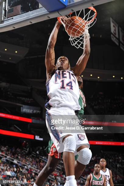 Derrick Favors of the New Jersey Nets dunks against the Milwaukee Bucks during the game on January 8, 2011 at the Prudential Center in Newark, New...