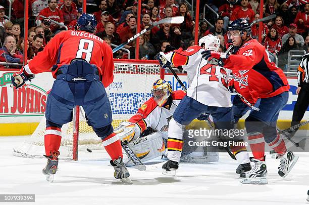 Mike Green of the Washington Capitals scores a goal in the third period against Scott Clemmensen of the Florida Panthers at the Verizon Center on...
