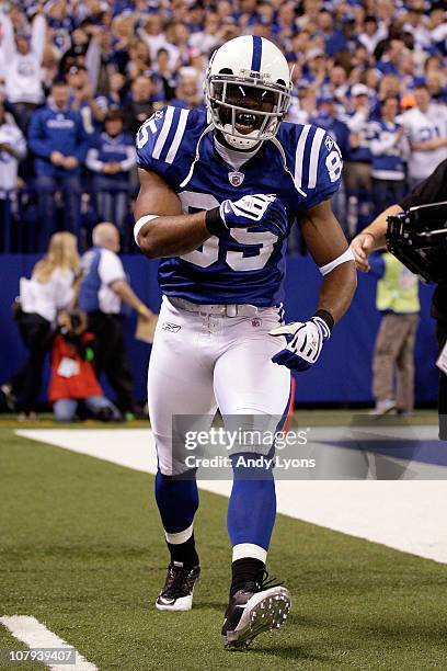 Pierre Garcon of the Indianapolis Colts celebrates after he scored on a 57-yard touchdown reception in the seocnd quarter against the New York Jets...