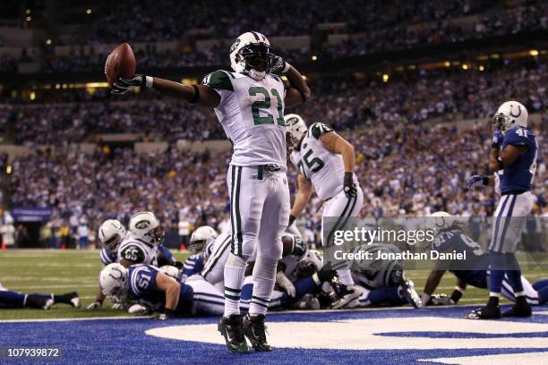 LaDainian Tomlinson of the New York Jets celebrates after he scored a 1-yard touchdown in the fourth quarter against the Indianapolis Colts during...