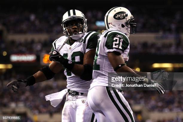 LaDainian Tomlinson and Tony Richardson of the New York Jets celebrates after Tomlinson scored a 1-yard rushing touchdown in the fourth quarter...