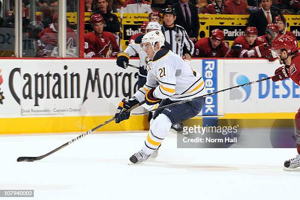 Drew Stafford of the Buffalo Sabres drives the puck to the net for the game-winning goal against the Phoenix Coyotes on January 8, 2011 at Jobing.com...