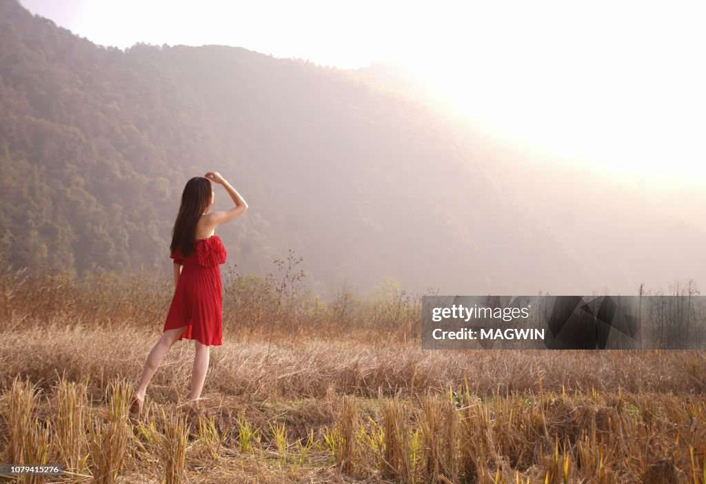 Waiving Rice Young Asian Woman In Red Skirt Dress In A Rice Field Waving With Arms ...