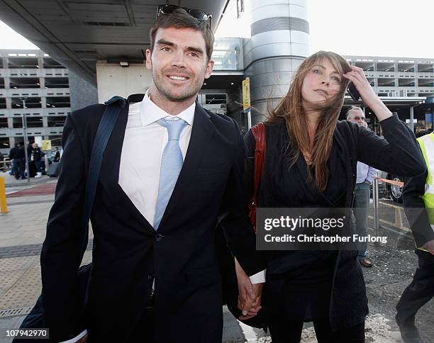 Cricketer James Anderson is greeted by his wife Daniella as he arrives back at Manchester Airport from Australia after England's Ashes victory on...