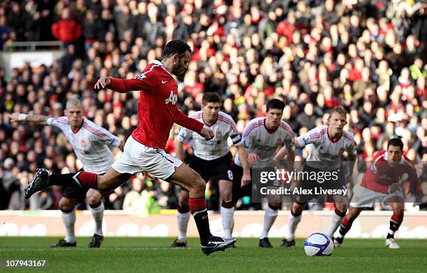 Ryan Giggs of Manchester United scores the opening goal from a penalty kick during the FA Cup sponsored by E.ON 3rd round match between Manchester...