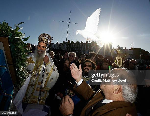 Dove is released as His Eminence Gregorios, Greek Orthodox Archbishop of Thyateira and Great Britain blesses the waters of the seaside town of...