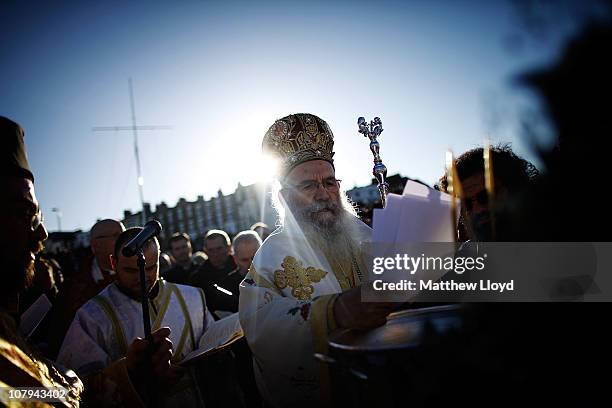 His Eminence Gregorios, Greek Orthodox Archbishop of Thyateira and Great Britain conducts a ceremony to bless the waters of the seaside town of...