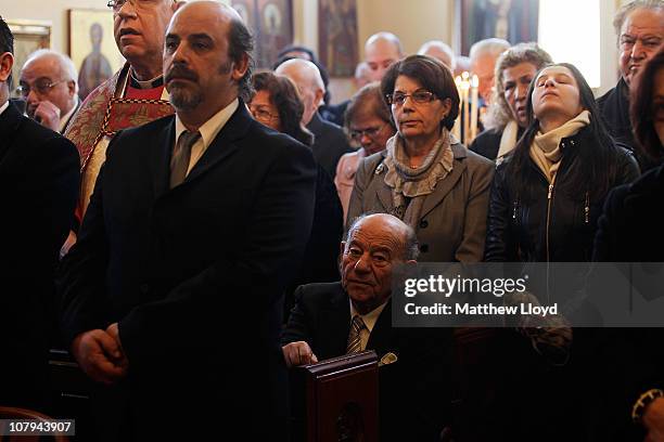 Parishioners pray as His Eminence Gregorios, Archbishop of Thyateira and Great Britain presides over the divine liturgy at the Parish of the Greek...