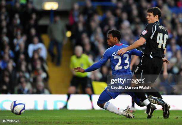 Daniel Sturridge of Chelsea scores his team's second goal under pressure from Darren O'Dea of Ipswich Town during the FA Cup sponsored by E.O.N 3rd...