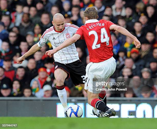 Jonjo Shevley of Liverpool competes with Darren Fletcher of Manchester United during the FA Cup Sponsored by E.ON 3rd Round match between Manchester...