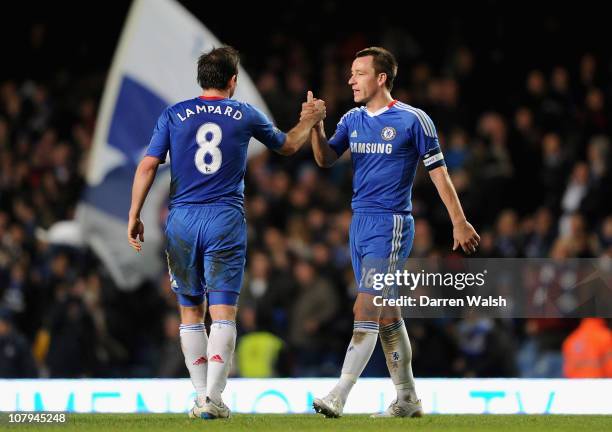 Frank Lampard and John Terry of Chelsea celebrate a 7-0 victory after the FA Cup sponsored by E.O.N 3rd Round match between Chelsea and Ipswich Town...