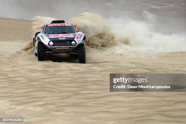 Raid Mini Jcw Team no. 308 MINI JOHN COOPER WORKS BUGGY car driven by Cyril Despres of France and Jean Paul Cottret of France compete in the desert...
