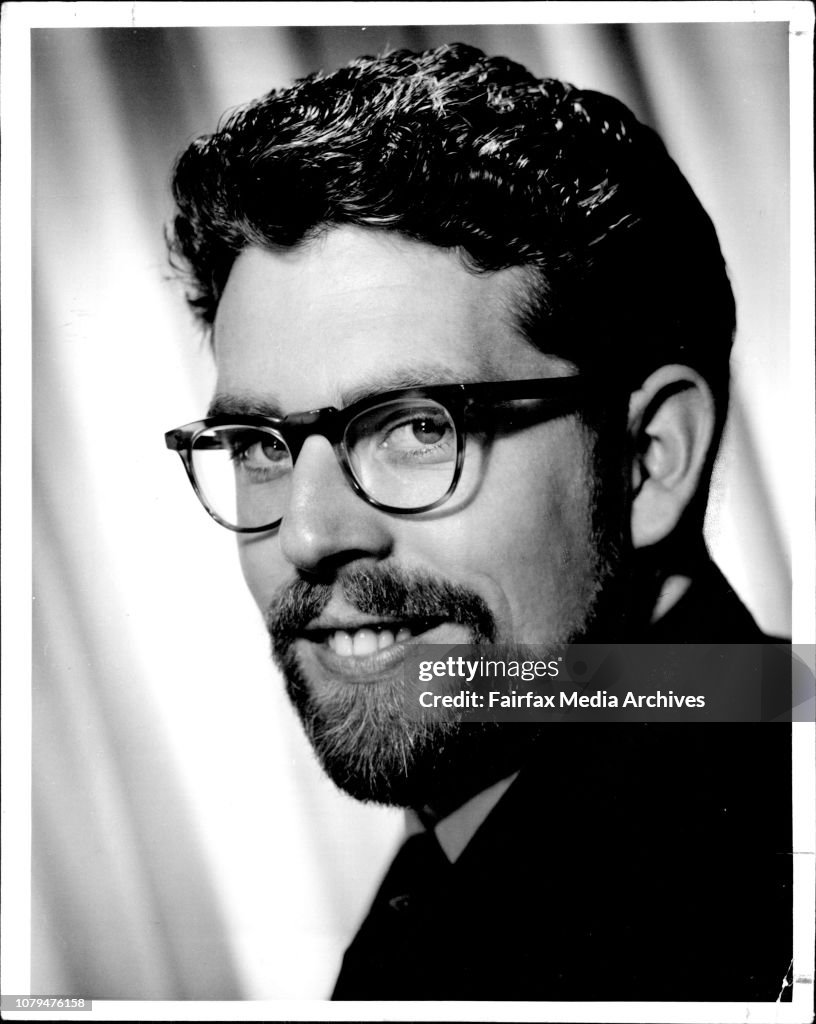 Rolf Harris with forest high school choir at the botanical gardens during the opening of Heritage week.Rolf Harris after planting a Coolabah tree at the royal botanic gardens is carried away by troopers.