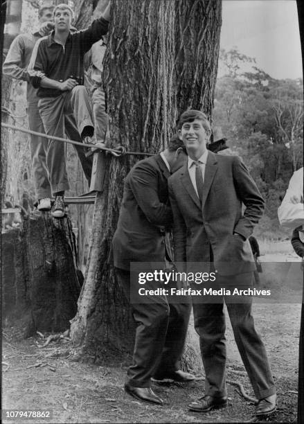 Prince Charles laughs as a lady falls of the roof on the Obstacle course at the Outward Bound School Fishermans point, Hawkesbury River behind...