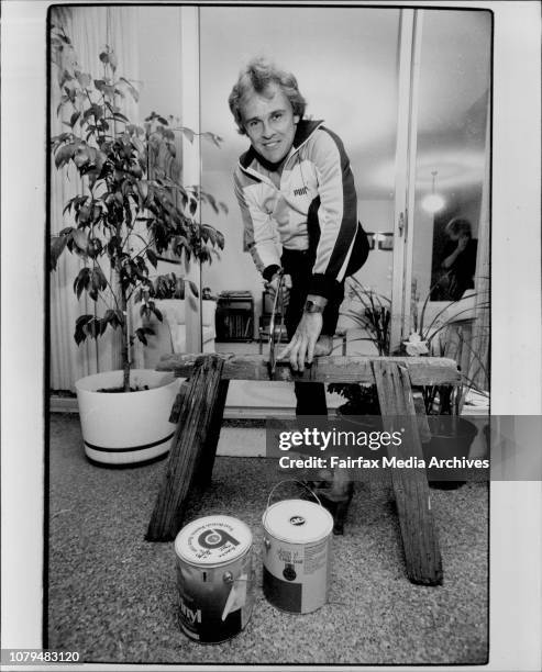 Dirk Wellham, cricketer seen here at his home at 3/7 Morrison rd. Gladesville, being the busy home - handiman that he is!. September 21, 1983. .