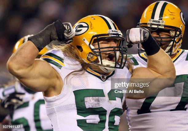 Clay Matthews of the Green Bay Packers celebrates after a sack against the Michael Vick of the Philadelphia Eagles during the 2011 NFC wild card...