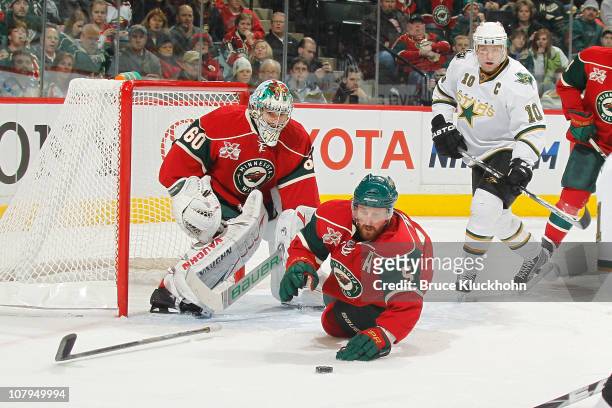 January 9: Jose Theodore and Greg Zanon of the Minnesota Wild defend their goal against Brenden Morrow of the Dallas Stars during the game at Xcel...