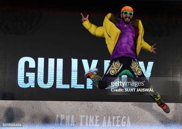 Indian Bollywood actor Ranveer Singh jumps on stage during the trailer launch of his upcoming musical Hindi film 'Gully Boy' directed by Zoya Akhtar...