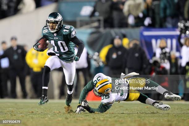 Wide receiver DeSean Jackson of the Philadelphia Eagles avoids the tackle of safety Nick Collins of the Green Bay Packers during the 2011 NFC wild...