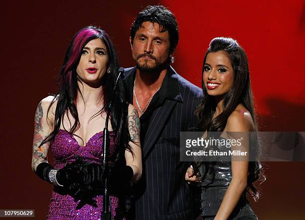 Adult film actors Joanna Angel, Tommy Gunn and Lupe Fuentes present an award at the 28th annual Adult Video News Awards Show at The Pearl concert...