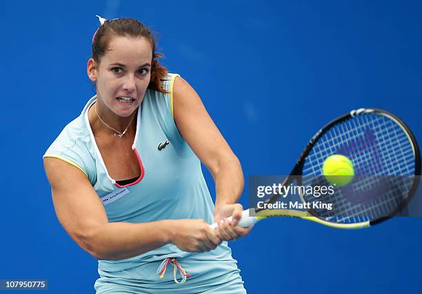 Jarmila Groth of Australia plays a backhand during her 1st round match against Johanna Larsson of Sweden during day two of the Moorilla Hobart...