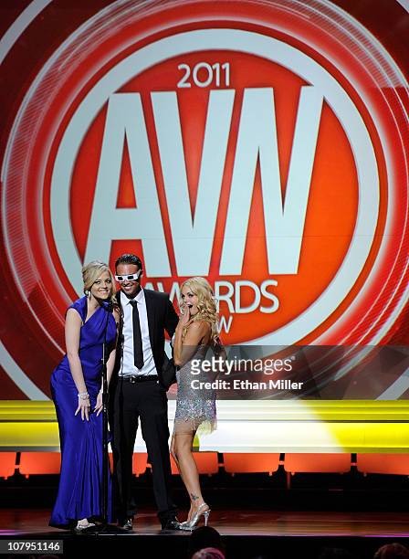 Adult film actors Alexis Texas, Rocco Reed and Jesse Jane present an award at the 28th annual Adult Video News Awards Show at The Pearl concert...