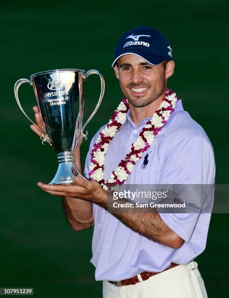 Jonathan Byrd poses with the trophy after winning the Hyundai Tournament of Champions at the Plantation course on January 9, 2011 in Kapalua, Hawaii.