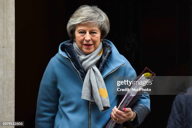 British Prime Minister Theresa May leaves 10 Downing Street to attend the weekly Prime Minister's Questions, London on January 9, 2019. The...