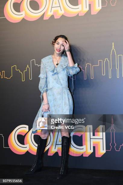 American-Japanese model Kiko Mizuhara poses backstage during the Coach 2019 early autumn collection fashion show 'Coach Lights Up Shanghai' on...