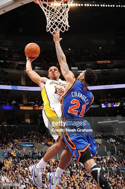 Shannon Brown of the Los Angeles Lakers goes up for a shot against Wilson Chandler of the New York Knicks at Staples Center on January 9, 2011 in Los...