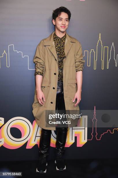 Actor Timmy Xu Weizhou poses backstage during the Coach 2019 early autumn collection fashion show 'Coach Lights Up Shanghai' on December 8, 2018 in...