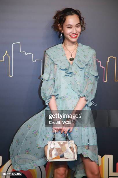 American-Japanese model Kiko Mizuhara poses backstage during the Coach 2019 early autumn collection fashion show 'Coach Lights Up Shanghai' on...