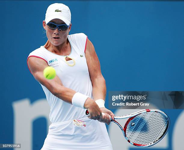 Samantha Stosur plays a backhand in her match against Yanina Wickmayer during day two of the 2011 Medibank International at Sydney Olympic Park...