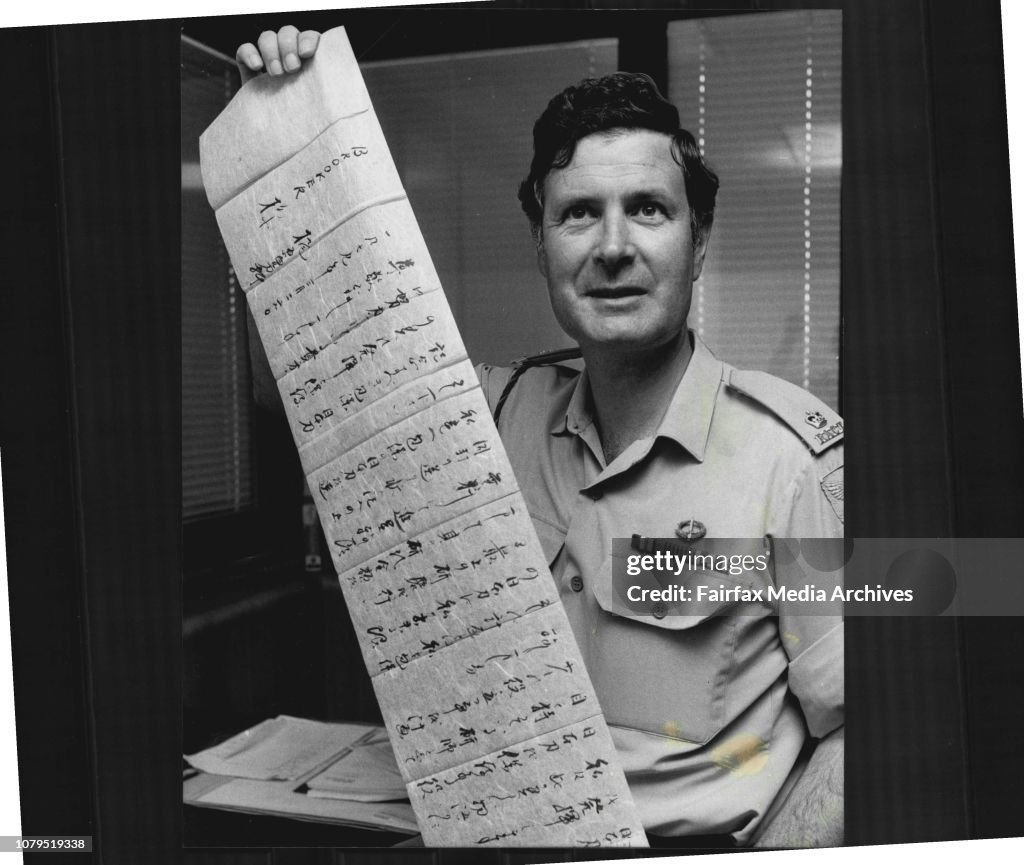 Australian Amy Major Ian Brookes is pictured with the traditional Japanese letter which was seat to him frog Japan He is pictured in his office in the City today.