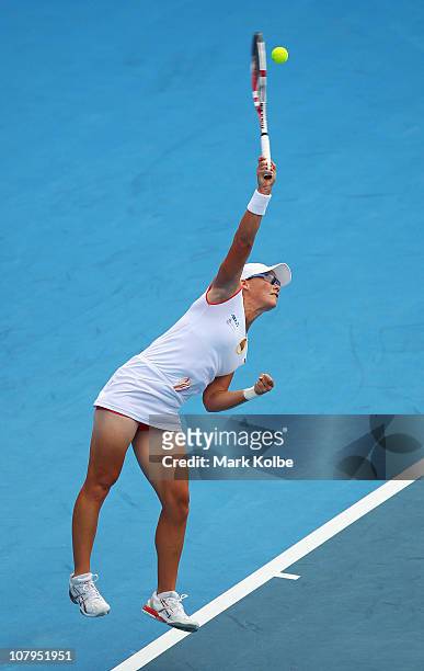 Samantha Stosur of Australia serves in her match against Yanina Wickmayer of Belgium during day two of the 2011 Medibank International at Sydney...