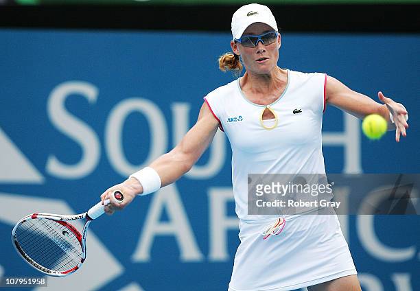 Samantha Stosur plays a forehand in her match against Yanina Wickmayer during day two of the 2011 Medibank International at Sydney Olympic Park...