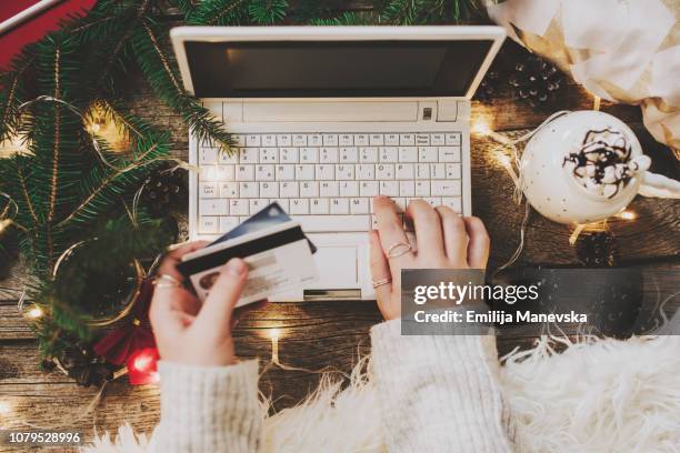 woman using credit card to shop online, close up - christmas budget stock pictures, royalty-free photos & images