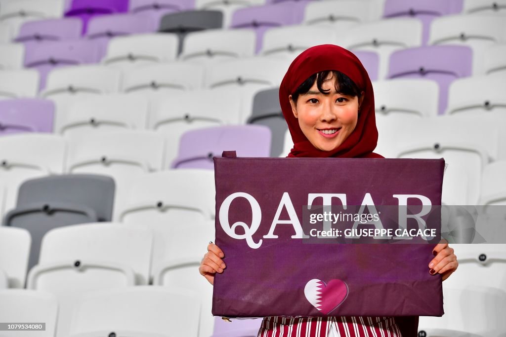 A Qatar supporter is pictured in the stands ahead of the 2019 AFC ...