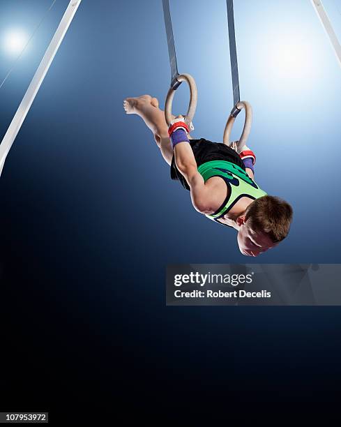 Ring Acrobatics Routine 12,777 Male Gymnast Rings Stock Photos, High-Res Pictures, and Images ...