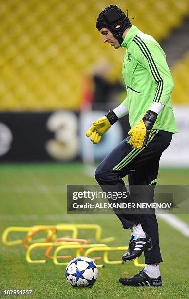 Chelsea goalkeeper Petr Cech warms up during a training session in Moscow on October 18 on the eve of their UEFA Champions League group F football...