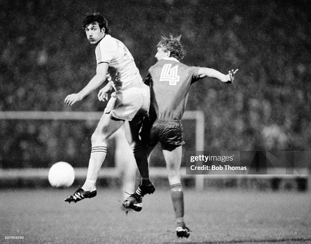 Garry Birtles of Nottingham Forest clashes with Andreas Ravelli of ...