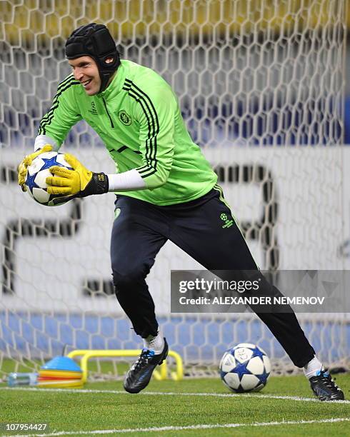 Chelsea goalkeeper Petr Cech warms up during a training session in Moscow on October 18 on the eve of their UEFA Champions League group F football...